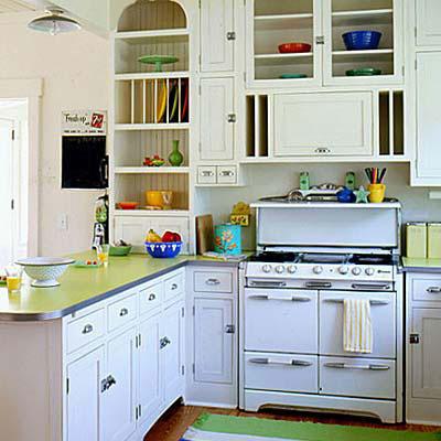 देश kitchen with a white wood cabinets and silver door handles