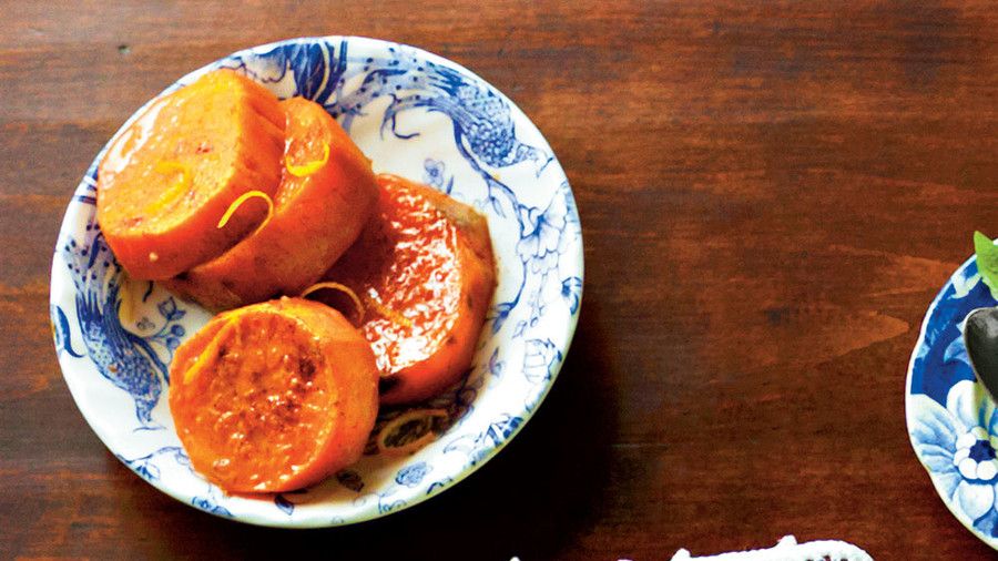 नारंगी चमकता हुआ Sweet Potatoes