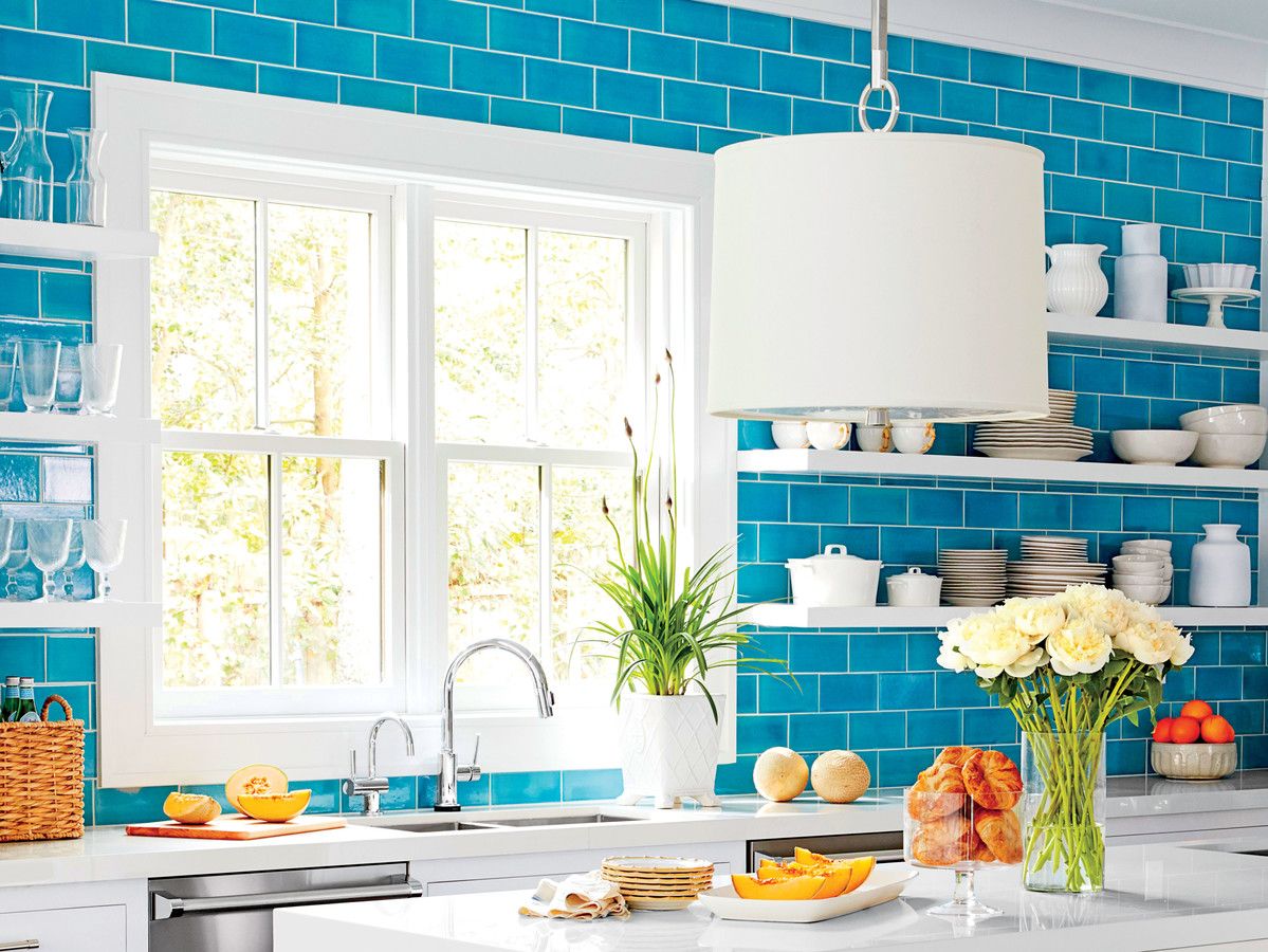 मेग Braff Teal Blue Tile Kitchen with White Cabinets