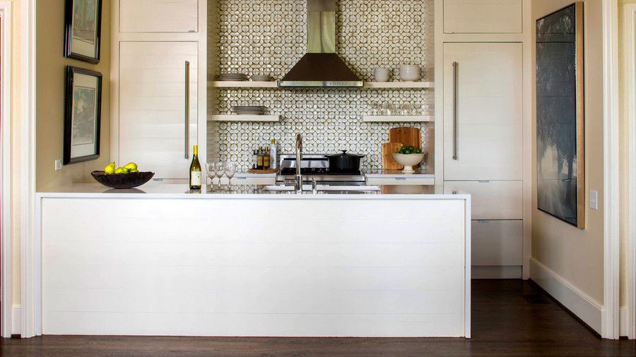 Kicsi Symmetrical Kitchen with Tile Backsplash