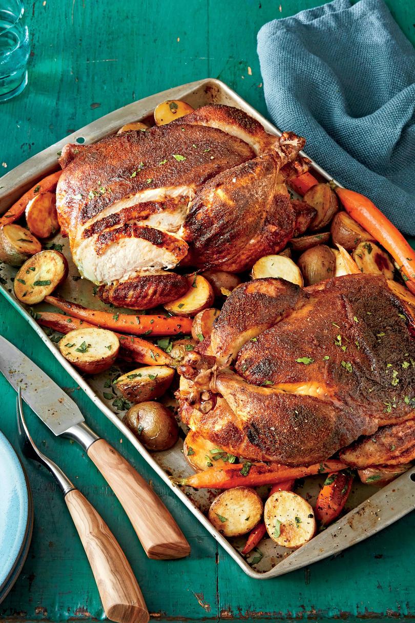 un barbecue Rub Roasted Chickens with Potatoes and Carrots