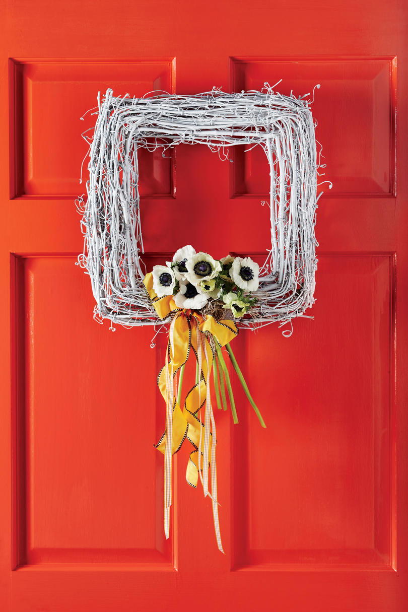 लाल Door with White Square Wreath and Flowers