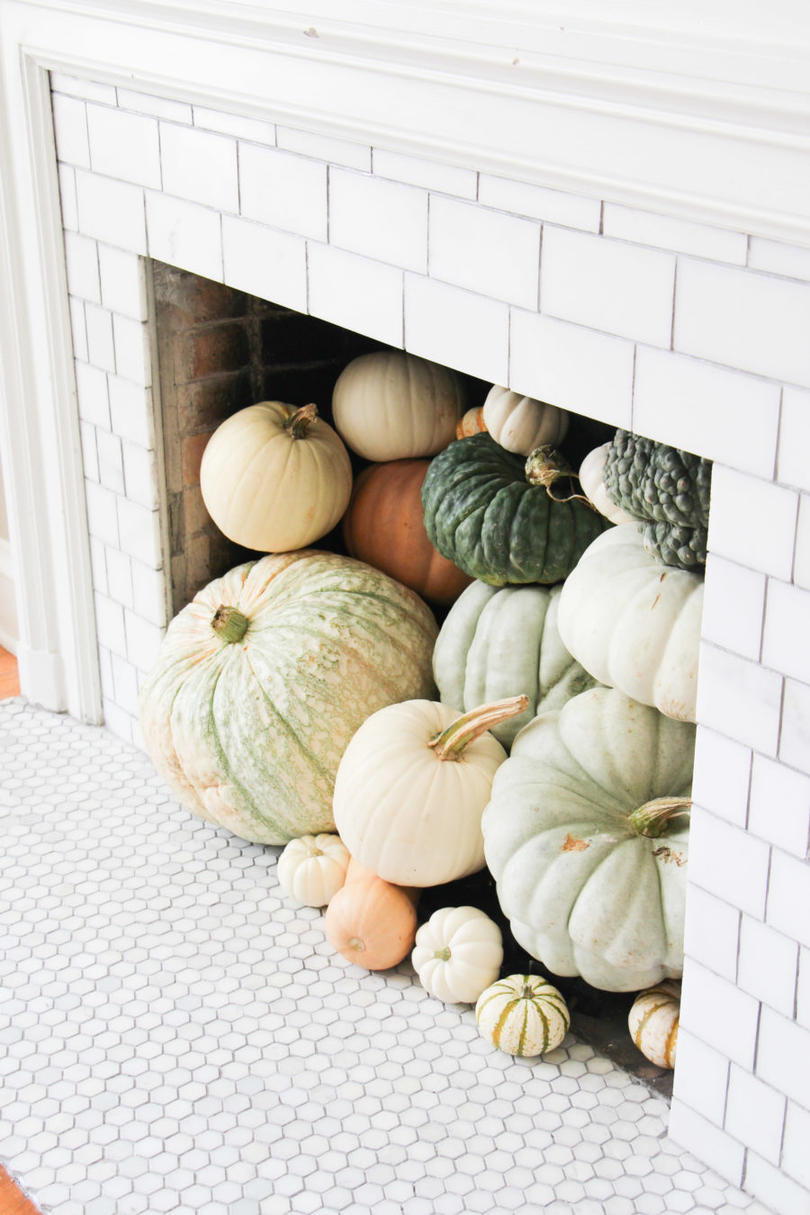 20 Incredible Ways to Decorate with Pumpkins This Fall Fill the Fireplace