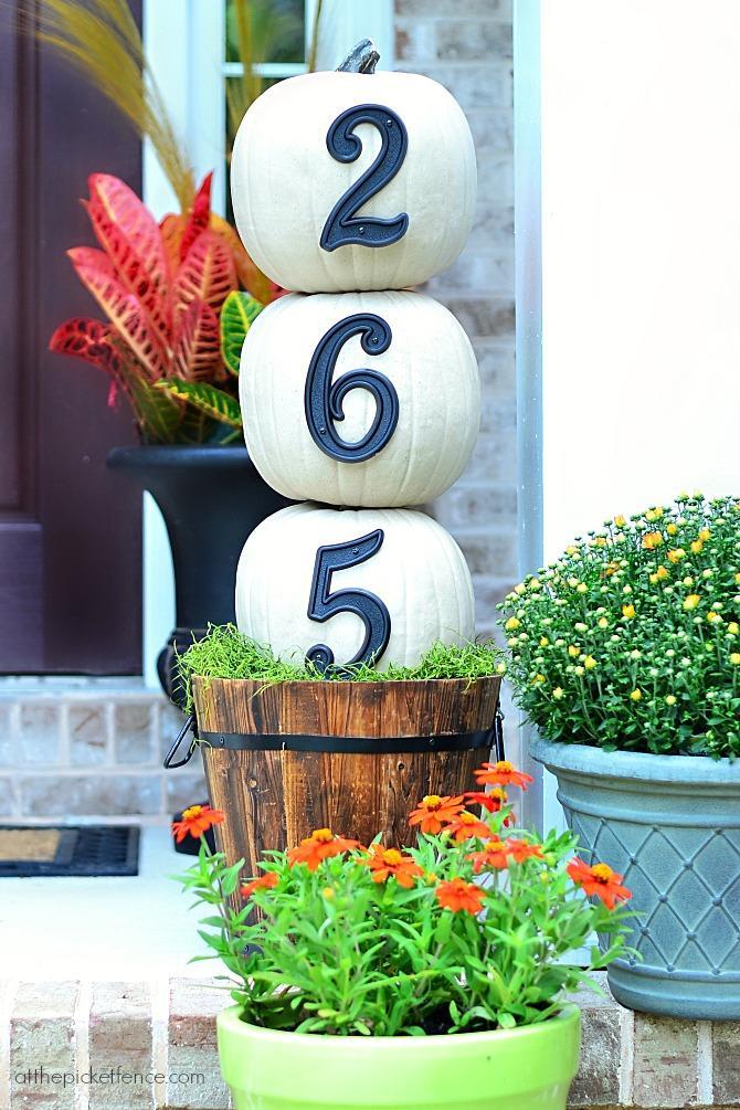 20 Incredible Ways to Decorate with Pumpkins This Fall Street Number Pumpkins