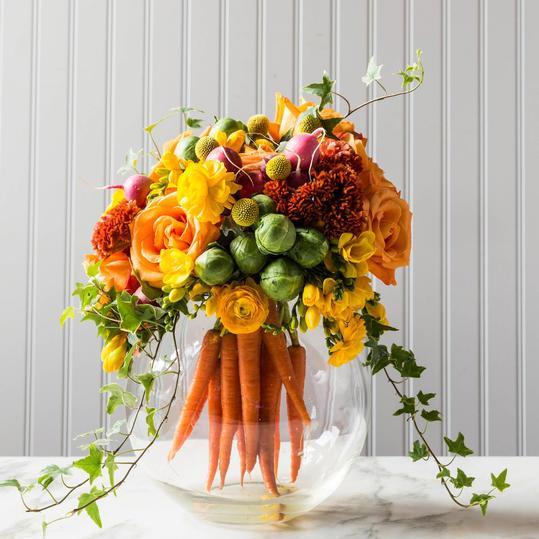 Porkkanat and Flowers Centerpiece in Vase
